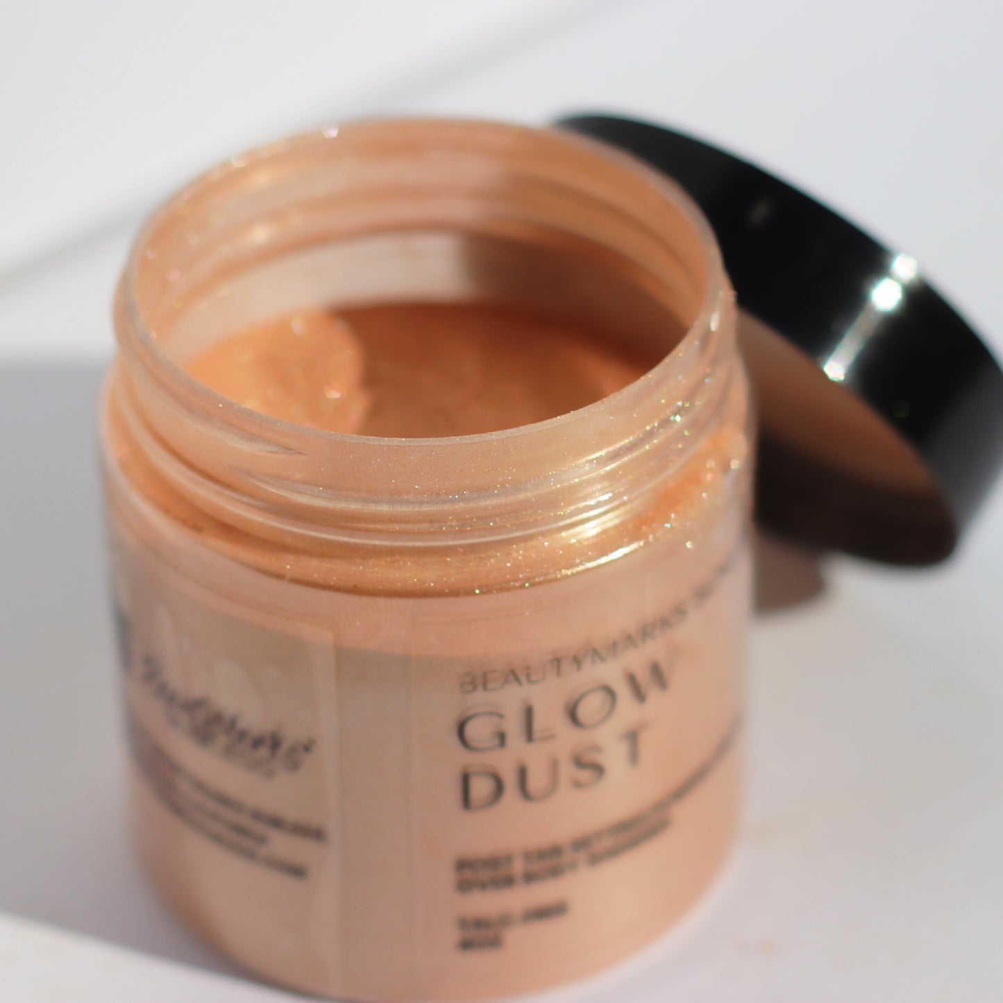 Glow Dust: Post Tan Setting Powder and All Over Body Shimmer